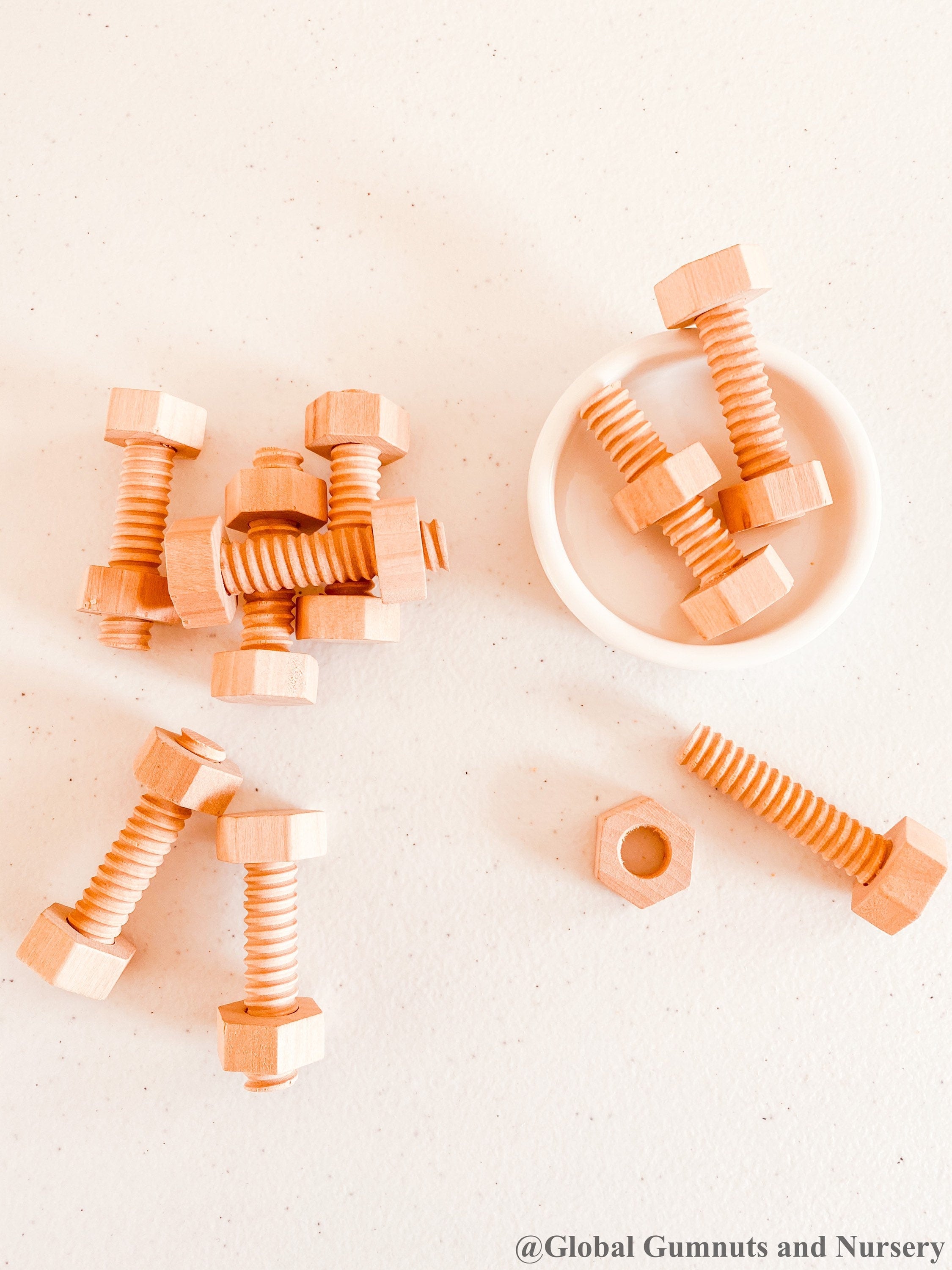 Wooden Nuts & Bolts Set: Six-piece set for motor skill development through play.
