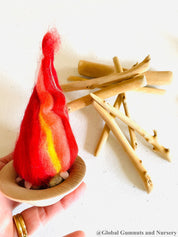 felt fireplace set: felt fireplace with decorative firewood and stones.