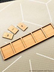Letter and Number Building Tray: Wooden tray for arranging and learning letters and numbers.