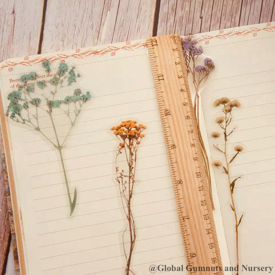 Floral scrapbooking set featuring intricate flower and sprig designs, perfect for creative journaling or crafts.
