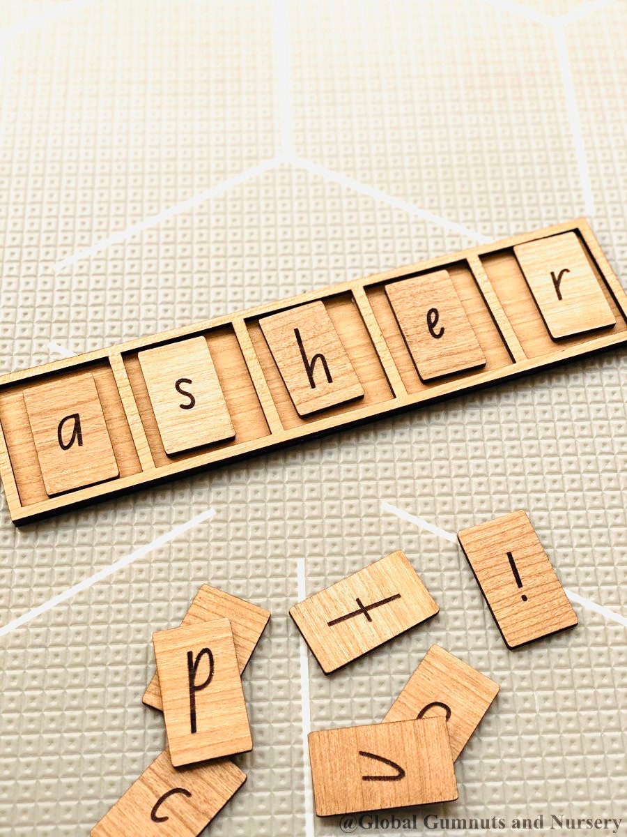 Letter and Number Building Tray: Wooden tray for arranging and learning letters and numbers.