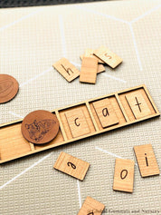 Letter and Number Building Tray: Wooden tray for arranging and learning letters and numbers.