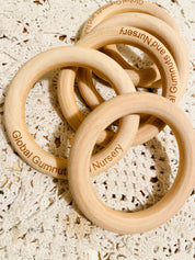 Wooden Rings 70mm: Versatile wooden rings for craft and educational use.