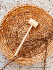 Child Wooden Hammer: Child-sized wooden hammer for sensory and motor skills development.