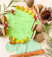 Roaming Dinosaurs Stamp Set: Six-piece dinosaur-themed gumnut stamp collection.