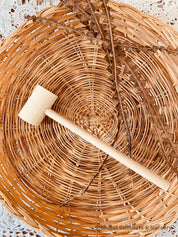 Child Wooden Hammer: Child-sized wooden hammer for sensory and motor skills development.