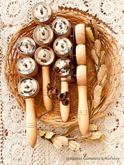 Jackie’s triple symbol shakers, a tactile and colorful musical instrument for play and rhythm exploration.
