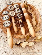 Jackie’s triple symbol shakers, a tactile and colorful musical instrument for play and rhythm exploration.