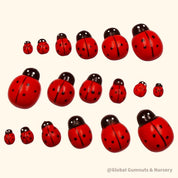 Wooden ladybirds (ladybugs), crafted without stickers for natural play.