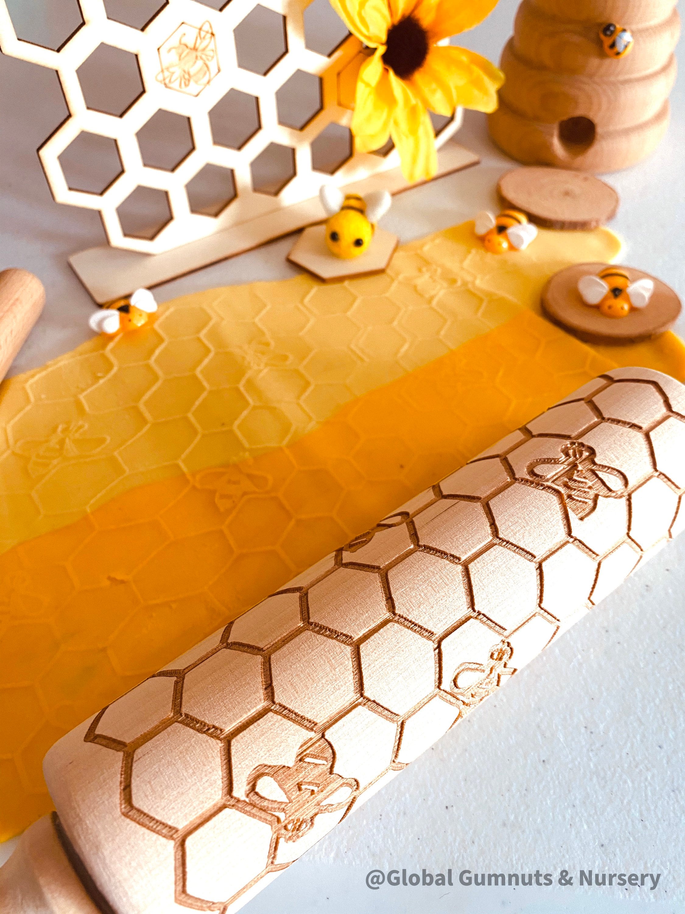 Honeycomb & Bees Rolling Pin: Wooden rolling pin with honeybee pattern for baking and crafting.
