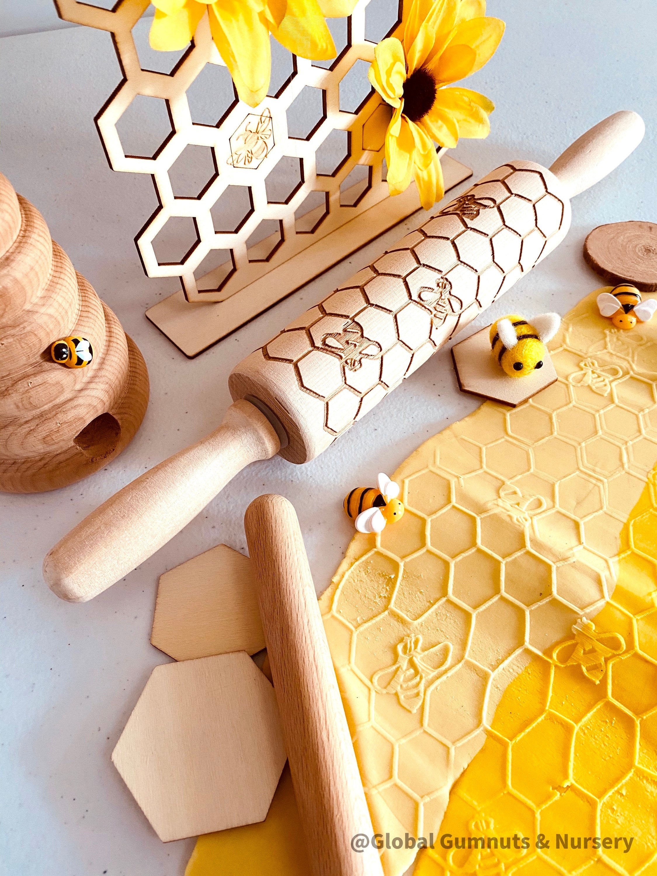 Honeycomb & Bees Rolling Pin: Wooden rolling pin with honeybee pattern for baking and crafting.
