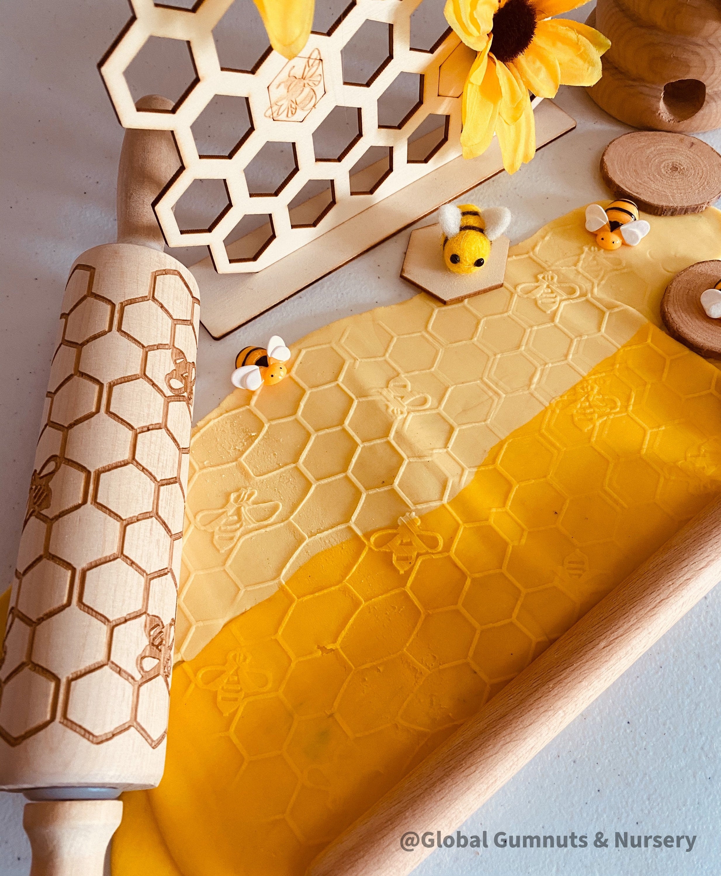 Honeycomb & Bees Rolling Pin: Wooden rolling pin with honeybee pattern for baking and crafting.