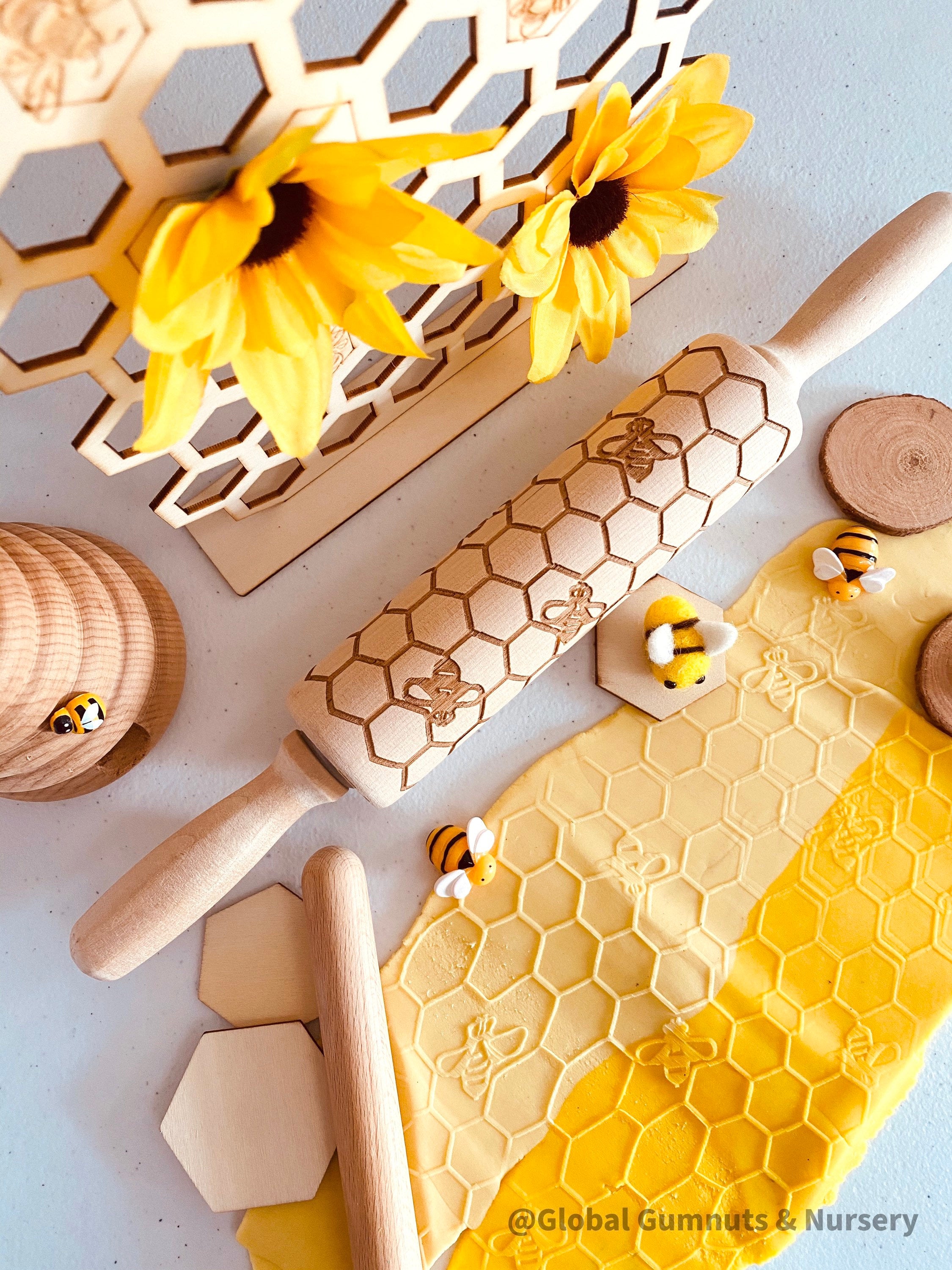 Honeycomb & Bees Rolling Pin: Wooden rolling pin with honeybee pattern for baking and crafting.