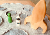 Wooden Rockets: Wooden space rockets for small world play.