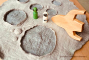 Wooden Rockets: Wooden space rockets for small world play.