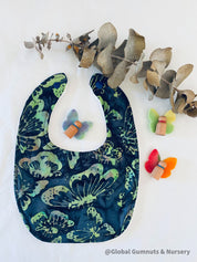 Butterfly Dreams Bib: Luxury bib with butterfly-themed design.