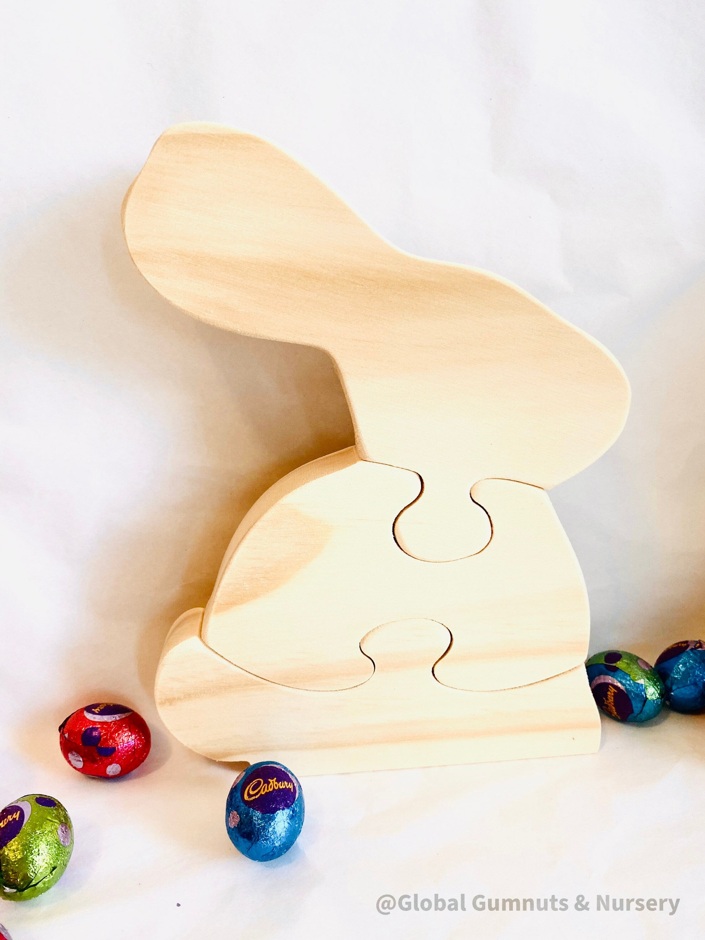 Wooden Bunny Rabbit Puzzle: Handmade rabbit puzzle for Easter-themed decor or play.