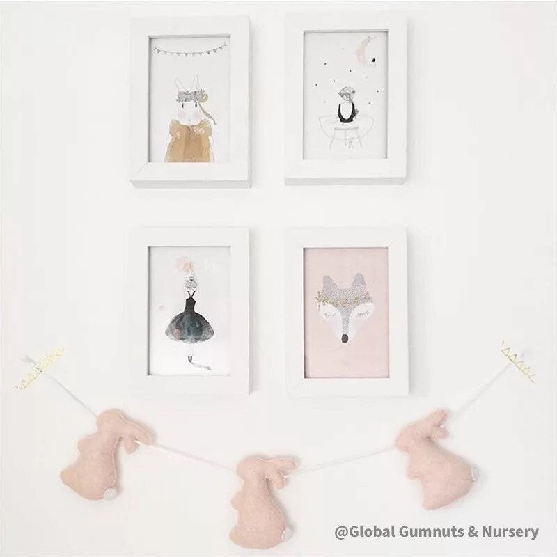Rabbit garland, a charming nursery or baby shower decor with felt rabbits and bunting.
