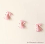 Rabbit garland, a charming nursery or baby shower decor with felt rabbits and bunting.
