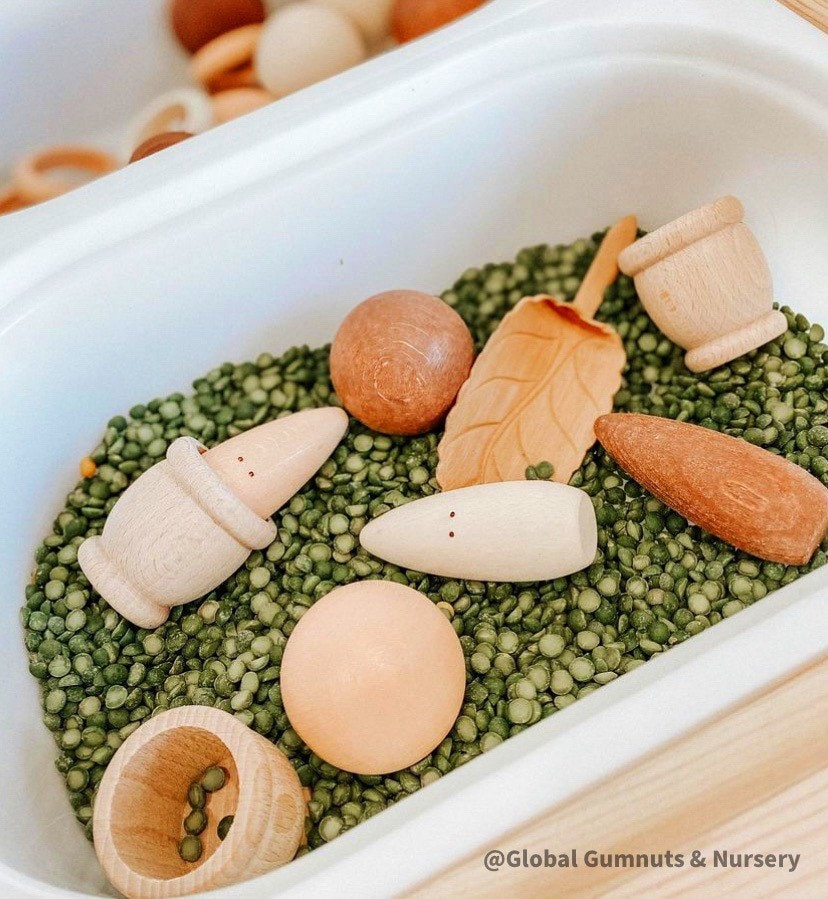 Natural Wood Leaf Spoon: Wooden scoop shaped like a leaf for sensory and craft play.