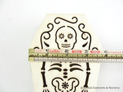Wooden coffin, perfect for Halloween décor featuring sugar skull or skeleton themes.
