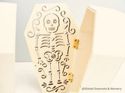 Wooden coffin, perfect for Halloween décor featuring sugar skull or skeleton themes.
