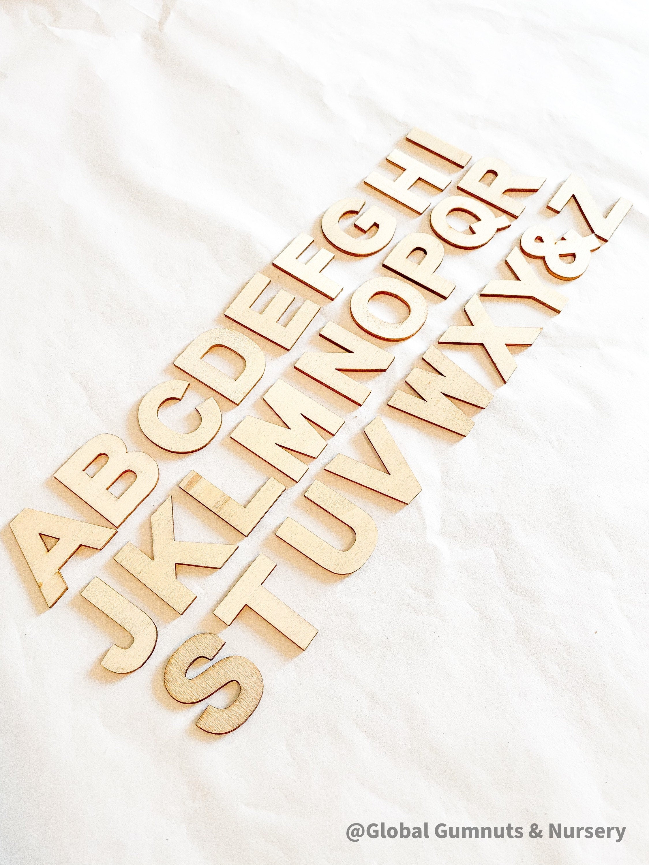 A-Z Wooden Alphabet Set: 26-piece wooden alphabet set for literacy and crafts.