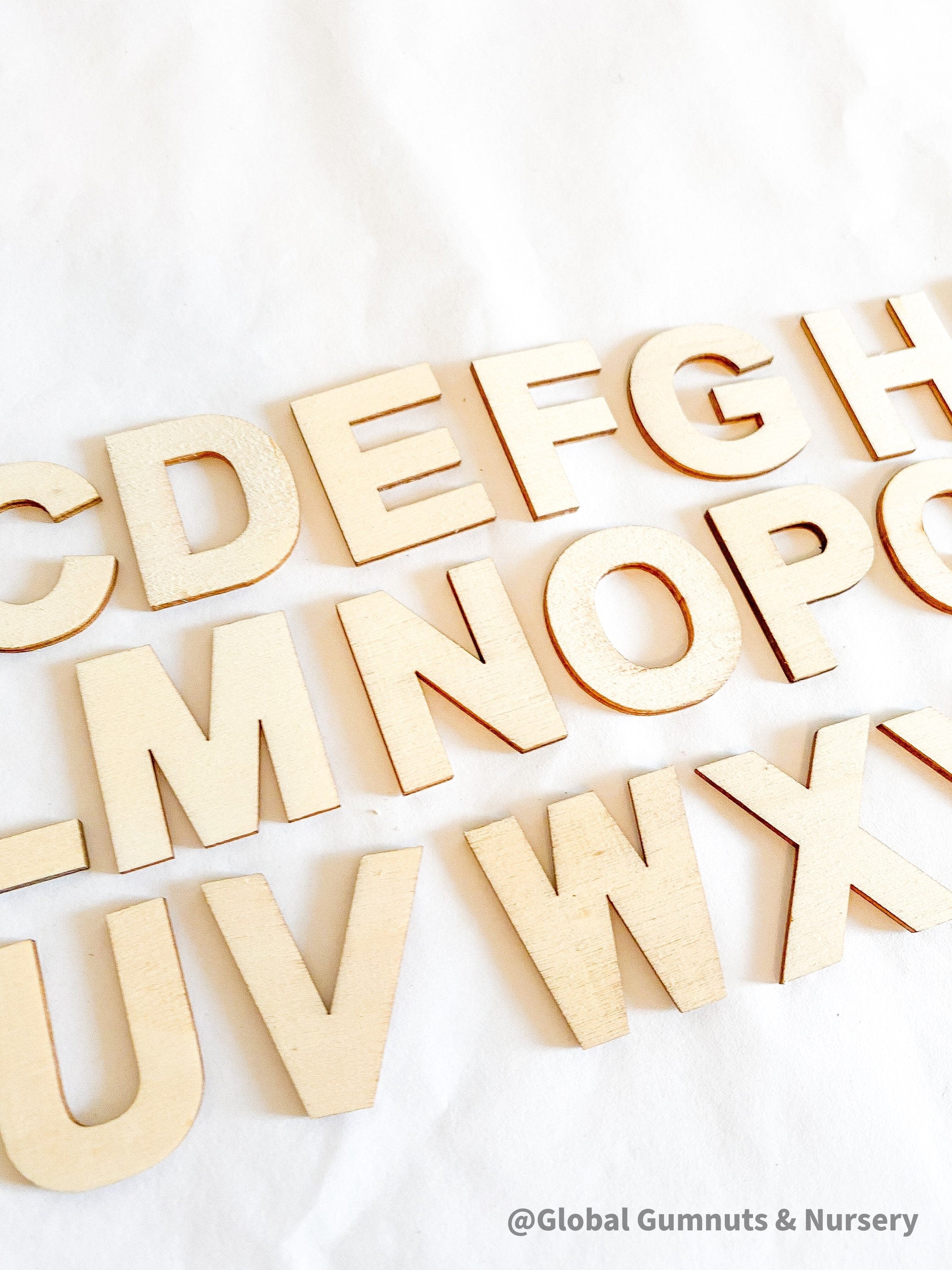 A-Z Wooden Alphabet Set: 26-piece wooden alphabet set for literacy and crafts.