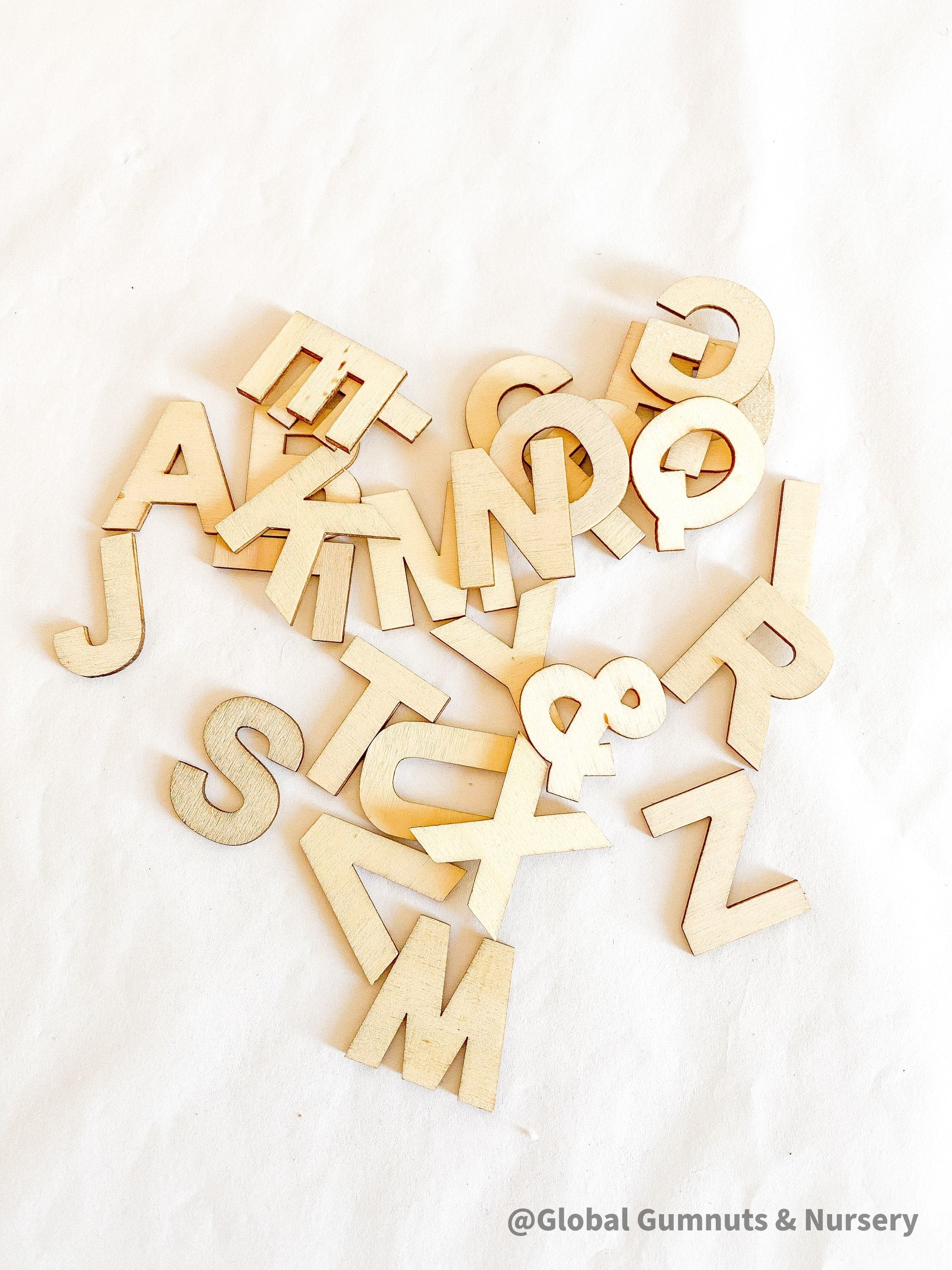 A-Z Wooden Alphabet Set: 26-piece wooden alphabet set for literacy and crafts.