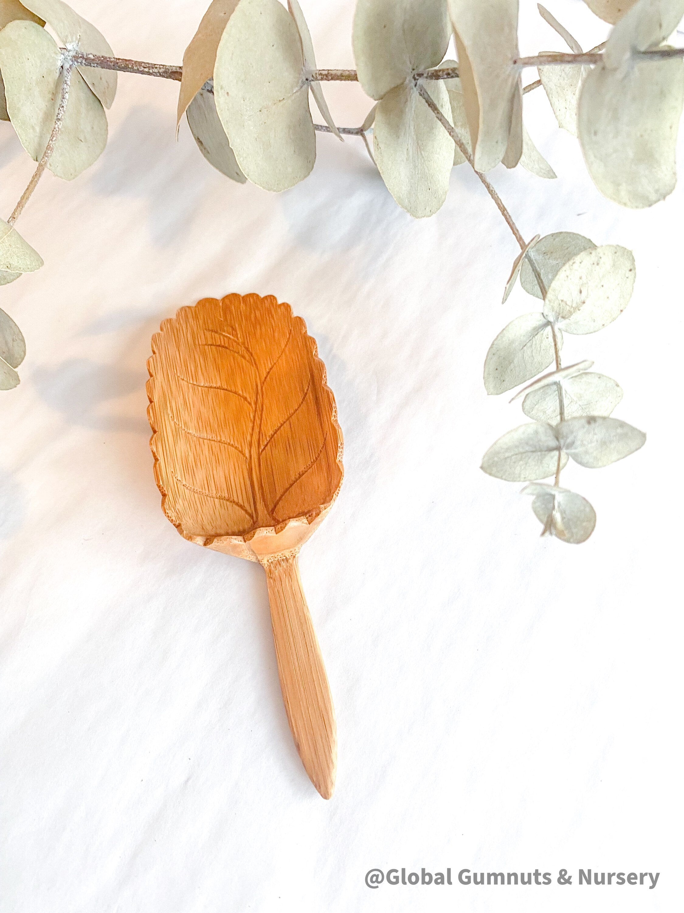 Natural Wood Leaf Spoon: Wooden scoop shaped like a leaf for sensory and craft play.