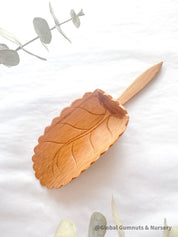 Natural Wood Leaf Spoon: Wooden scoop shaped like a leaf for sensory and craft play.