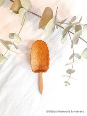 Natural Wood Leaf Spoon: Wooden scoop shaped like a leaf for sensory and craft play.