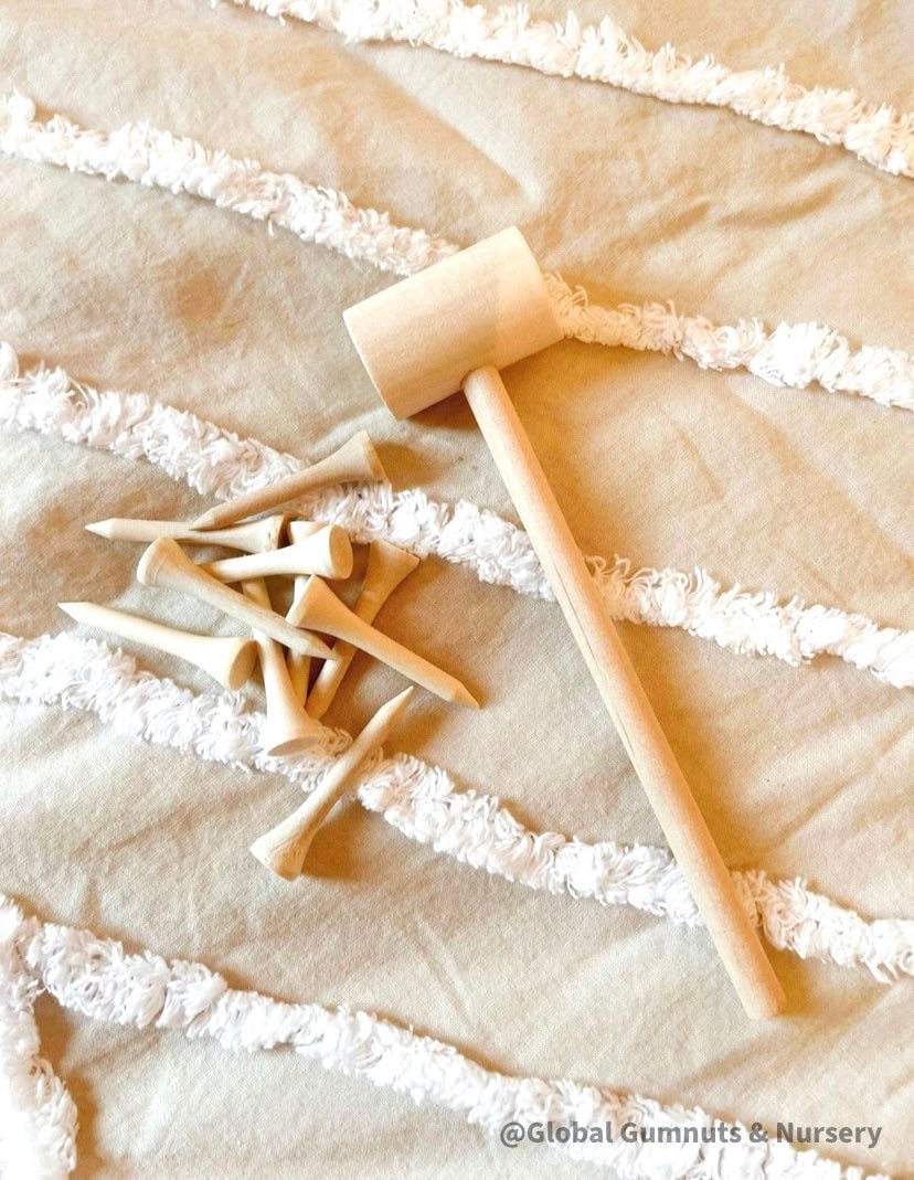 Child Wooden Hammer: Child-sized wooden hammer for sensory and motor skills development.