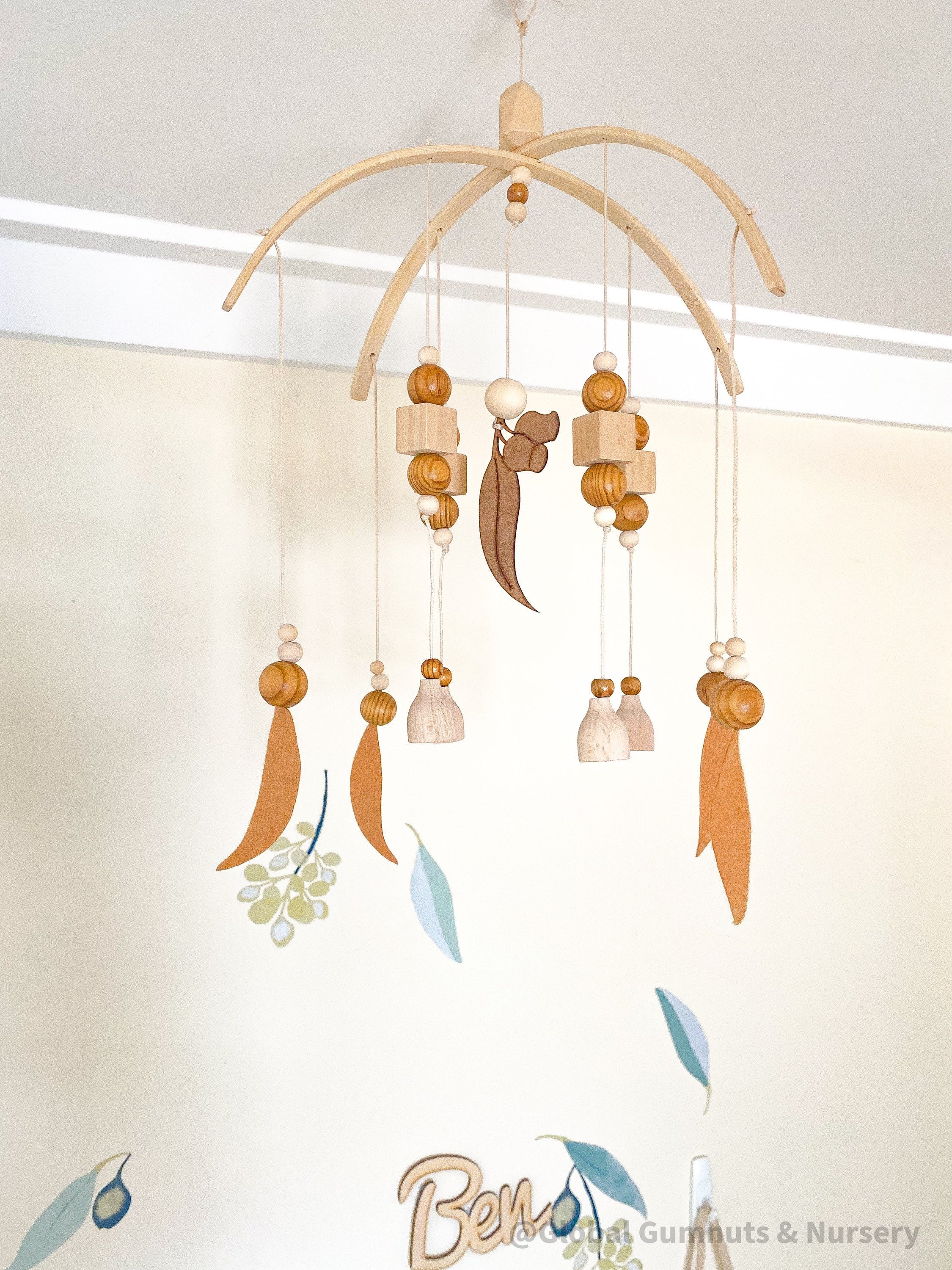 Australian Felt Gumleaf Mobile: Handmade Australian gumleaf mobile with dark wooden beads, inspired by native nature.