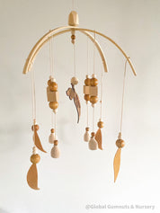 Australian Felt Gumleaf Mobile: Handmade Australian gumleaf mobile with dark wooden beads, inspired by native nature.