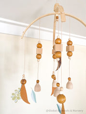 Australian Felt Gumleaf Mobile: Handmade Australian gumleaf mobile with dark wooden beads, inspired by native nature.