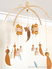 Australian Felt Gumleaf Mobile: Handmade Australian gumleaf mobile with dark wooden beads, inspired by native nature.