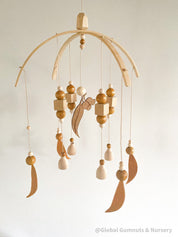 australian felt gumleaf mobile: handmade australian gumleaf mobile with dark wooden beads, inspired by native nature.