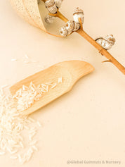 Flat rectangle scooper made of natural wood, perfect for sensory play and Montessori activities.