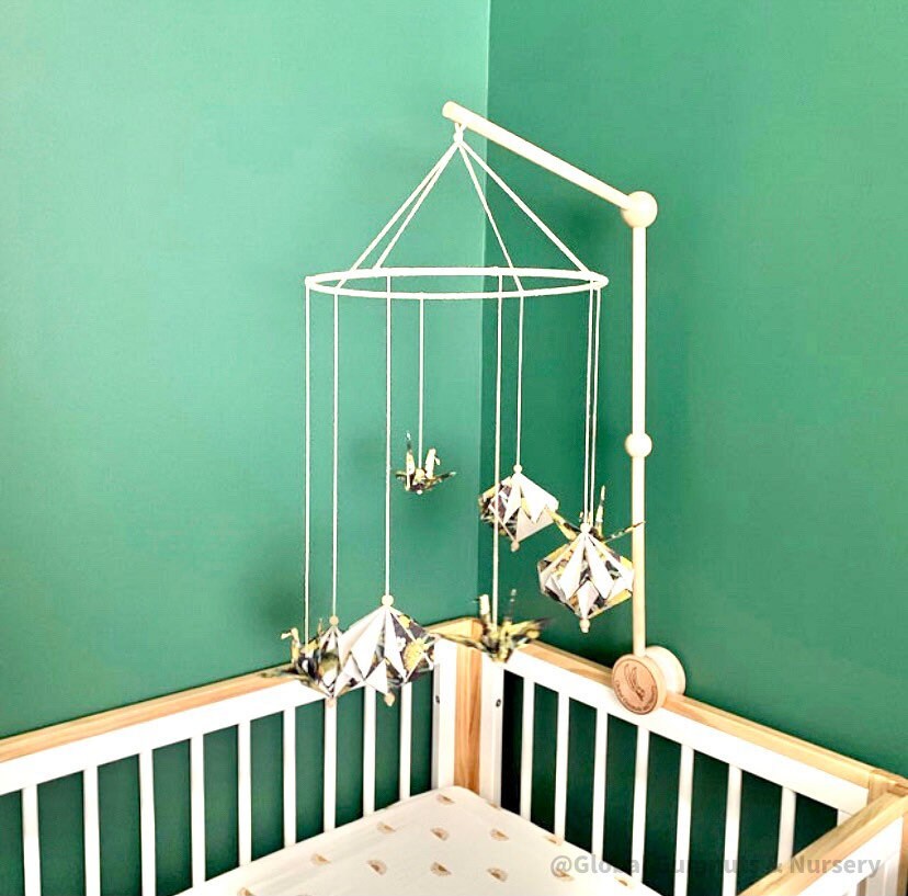 Mobile Arms Nursery Attachment: Wooden mobile hanger arms for cribs or nursery displays, designed to hang decorative items securely.