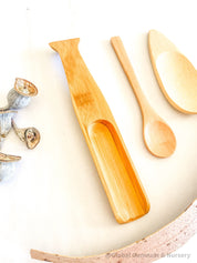Long Spoon Scoop: Natural wooden long-handled spoon for sensory use.