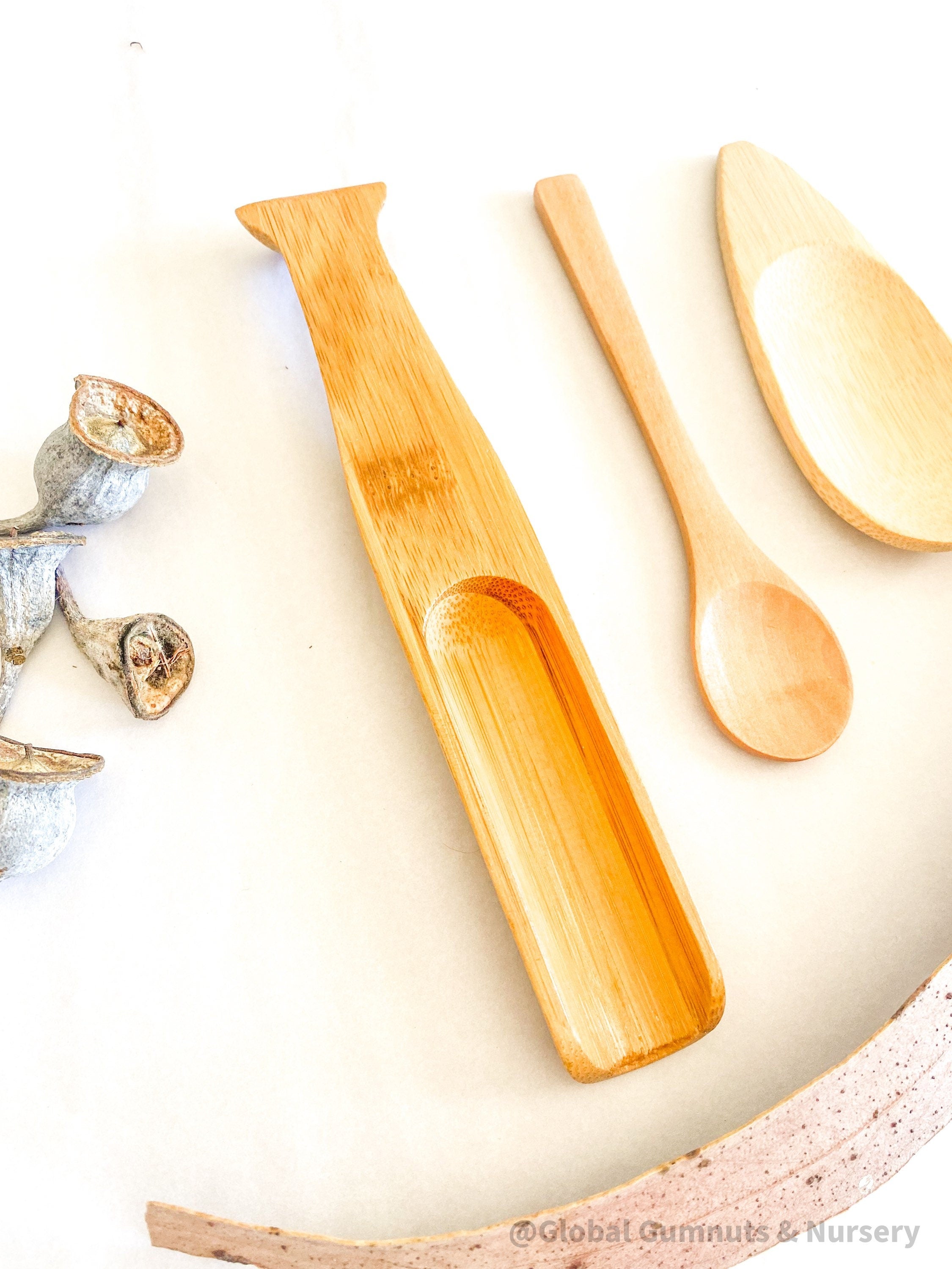 Long Spoon Scoop: Natural wooden long-handled spoon for sensory use.