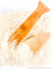 Long Spoon Scoop: Natural wooden long-handled spoon for sensory use.