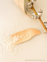 Flat rectangle scooper made of natural wood, perfect for sensory play and Montessori activities.
