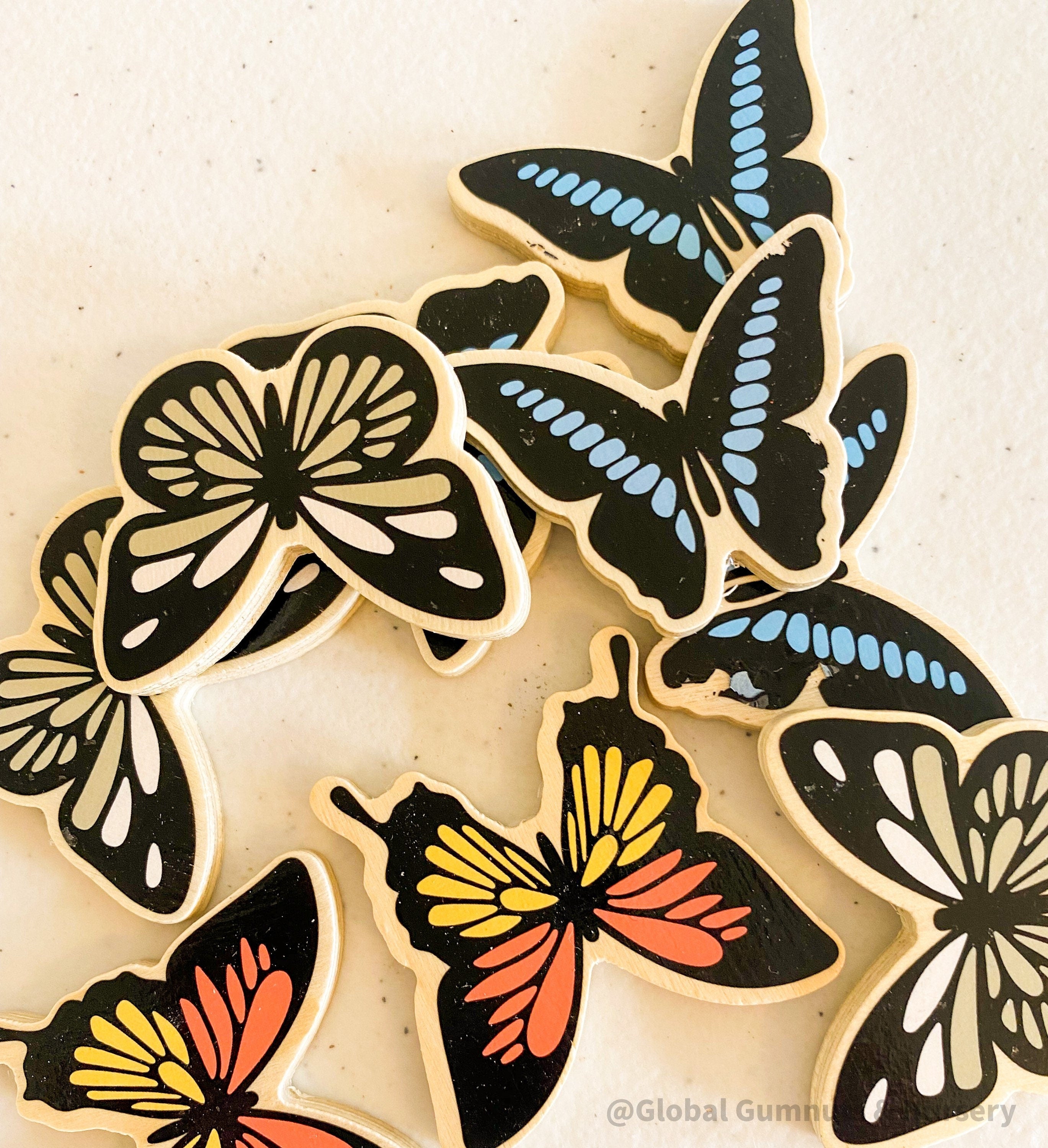 Colourful Wooden Butterflies: Five vibrant butterflies for play or decor.