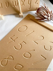 NUMBERS 0-9 Tracing Board: Montessori-style wooden tracing board with a stylus, helping children learn to trace and recognize numbers.