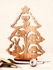Small Australian Christmas tree scene (Gumtree) with stand, perfect for festive decor.