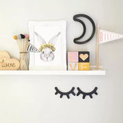Sleepy eyes decor, a whimsical touch for nursery or kids' rooms.