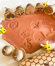 Honeybee Stamp Set: Eight-piece Gumnut stamp set with a beekeeping theme.