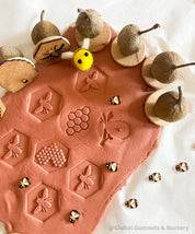 Honeybee Stamp Set: Eight-piece Gumnut stamp set with a beekeeping theme.